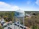 Striking water tower with 'Holly Springs' against a scenic landscape backdrop at 5125 Salinas Ct, Holly Springs, NC 27540
