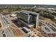 Exterior aerial of large office building with modern glass and brick facade at 5125 Salinas Ct, Holly Springs, NC 27540