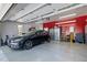 Spacious garage with car, lighting, and storage at 5125 Salinas Ct, Holly Springs, NC 27540