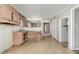 View of a kitchen with pink cabinets, older appliances, and a vintage design at 5324 Rock Quarry Rd, Raleigh, NC 27610