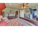 Comfortable bedroom with a ceiling fan, and ensuite bathroom at 5595 Godwin Lake Rd, Benson, NC 27504