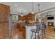 Beautiful kitchen with granite counters, wood cabinets, a breakfast bar, and stainless steel appliances at 5595 Godwin Lake Rd, Benson, NC 27504