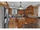 Updated kitchen with modern appliances, custom cabinetry, and a functional center island at 5595 Godwin Lake Rd, Benson, NC 27504
