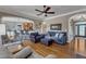 Comfortable living room with a view of the kitchen featuring hardwood floors at 5595 Godwin Lake Rd, Benson, NC 27504