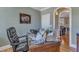 A comfortable leather office chair and a doorway to the living room create a nice flow in this dedicated office space at 5595 Godwin Lake Rd, Benson, NC 27504