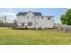 Spacious backyard with a deck perfect for entertaining and relaxing on sunny days at 5745 Spence Farm Rd, Holly Springs, NC 27540
