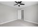 Cozy bedroom with a ceiling fan, and a neutral color scheme at 5745 Spence Farm Rd, Holly Springs, NC 27540
