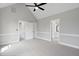 Spacious bedroom with vaulted ceiling, carpet and an en-suite bathroom at 5745 Spence Farm Rd, Holly Springs, NC 27540