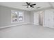 Bedroom with lots of natural light, carpet, and a ceiling fan at 5745 Spence Farm Rd, Holly Springs, NC 27540
