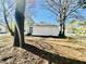 Back exterior showcasing the home's white siding and fenced-in backyard at 602 Dexter St, Rocky Mount, NC 27803