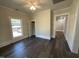 Bedroom with light-colored walls, wood flooring, natural light, and a closet at 602 Dexter St, Rocky Mount, NC 27803