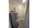 Compact utility room with an AOSmith water heater and durable plank flooring at 602 Dexter St, Rocky Mount, NC 27803