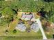Beautiful aerial shot of a home surrounded by mature trees and manicured landscaping at 6521 Vintage Ridge Ln, Fuquay Varina, NC 27526