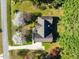 A home with gray roof and traditional landscaping offering a generous lot size in a quiet location at 6521 Vintage Ridge Ln, Fuquay Varina, NC 27526