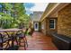 Enjoy outdoor living on this wood deck with room for grilling and dining near the house at 6521 Vintage Ridge Ln, Fuquay Varina, NC 27526