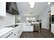 Expansive chef's kitchen with an open layout featuring an eat-in area and stainless steel appliances at 6521 Vintage Ridge Ln, Fuquay Varina, NC 27526