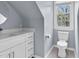 Bathroom featuring a modern vanity and toilet at 7616 Valley Run Dr, Raleigh, NC 27615