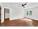 Bright room with hardwood floors, white walls, large window and natural light at 7616 Valley Run Dr, Raleigh, NC 27615