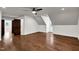 Bedroom features hardwood floors, white walls, and a ceiling fan at 7616 Valley Run Dr, Raleigh, NC 27615