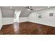 Spacious bedroom with hardwood floors, a ceiling fan, and bright natural light from multiple windows at 7616 Valley Run Dr, Raleigh, NC 27615