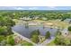 Aerial view of a park, lake, and neighborhoods showcasing Angier's recreational areas and community spaces at 779 Old Station Pointe, Angier, NC 27501