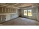 Bedroom with a large window and neutral walls, offering a calming atmosphere at 779 Old Station Pointe, Angier, NC 27501