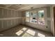Bright bedroom featuring three large windows that allow plenty of natural light at 779 Old Station Pointe, Angier, NC 27501