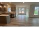 Bright dining area with sliding glass doors offering access to the backyard and ample natural light at 779 Old Station Pointe, Angier, NC 27501