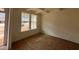 Sunlit room features fresh paint, substantial windows, and decorative trim at 779 Old Station Pointe, Angier, NC 27501