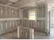 Under-construction kitchen with open layout and modern trimwork at 779 Old Station Pointe, Angier, NC 27501