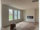 Bright living room with fireplace, large windows and freshly painted at 779 Old Station Pointe, Angier, NC 27501
