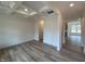 Bright living room boasting a coffered ceiling and hardwood floors, perfect for entertaining at 779 Old Station Pointe, Angier, NC 27501