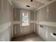 A cozy room with a window, perfect for a home office or guest room at 779 Old Station Pointe, Angier, NC 27501