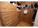 Wood paneled closet with built-in drawers at 817 Old Mill Rd, Chapel Hill, NC 27514