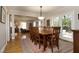 Formal dining room featuring a wooden table, chairs, and rug at 817 Old Mill Rd, Chapel Hill, NC 27514