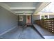 Covered carport and wheelchair ramp leading to the side door of the home at 817 Old Mill Rd, Chapel Hill, NC 27514