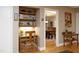 Cozy office nook with built-in shelving and a view into the dining room at 817 Old Mill Rd, Chapel Hill, NC 27514