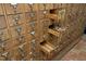 Unique storage featuring many drawers, some of which are open revealing contents at 817 Old Mill Rd, Chapel Hill, NC 27514