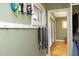 Angled view of a walk-in closet, showing organization with shelves and hanging clothing at 817 Old Mill Rd, Chapel Hill, NC 27514