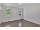 Spacious unfinished basement with bright windows and neutral-toned walls, offering potential for customization at 85 Christenbury Ln, Clayton, NC 27527