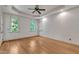 Bright and airy bedroom with tray ceilings, hardwood floors, and abundant natural light at 85 Christenbury Ln, Clayton, NC 27527