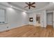 Bedroom featuring a fireplace and doorway access to an ensuite bathroom at 85 Christenbury Ln, Clayton, NC 27527