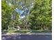 Charming single-story home with mature trees and a well-maintained lawn for great curb appeal at 85 Christenbury Ln, Clayton, NC 27527