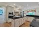 Bright kitchen with island, stainless steel appliances, and ample counter space at 85 Christenbury Ln, Clayton, NC 27527