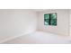 Bright, minimalist bedroom with neutral carpet and natural light from a window at 92 Bluffside Ct, Pittsboro, NC 27312