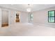 Large main bedroom features neutral walls and views of a bathroom at 92 Bluffside Ct, Pittsboro, NC 27312