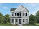 Charming two-story home with gray siding, black shutters, and stone accents on the front exterior at 304 Calvander Ln, Apex, NC 27539