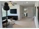 Spacious living room boasting neutral carpets, a ceiling fan and an abundance of natural light and an open concept layout at 0001 Luke Lane, Cedar Grove, NC 27231
