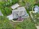 Beautiful home with basketball court, mature trees and landscaping shown in aerial view at 101 Goldenthal Ct, Cary, NC 27519