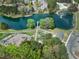 Aerial view of community amenities including playground, lake, and walking paths at 101 Goldenthal Ct, Cary, NC 27519